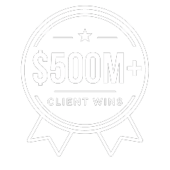 A circular badge with a star at the top, the text $500M+ Client Wins in the center, and two ribbon shapes at the bottom.